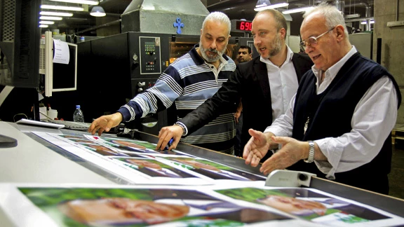 Doumit Raidy, General Manager of Raidy printing house checks the work in Fayadiyeh east of Beirut. Photo Marwan Naamani/IFC (2018)